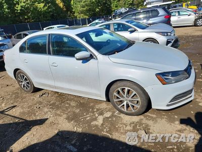 Czwarte zdjęcie samochodu z boku: 2017 VOLKSWAGEN JETTA SE VIN:3VWDB7AJ3HM233274 - miniatura