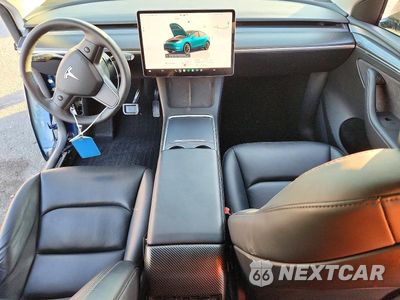 Zdjęcie 8 z 14 samochodu: 2023 TESLA MODEL Y VIN:7SAYGDEE8PF937655 - miniatura
