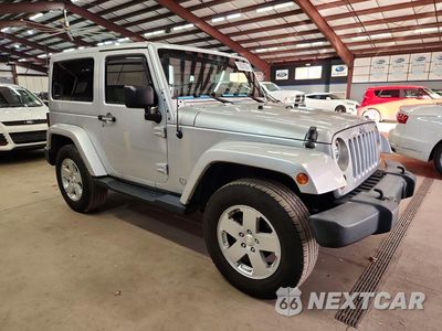 Czwarte zdjęcie samochodu z boku: 2012 JEEP WRANGLER SAHARA VIN:1C4GJWBG1CL105951 - miniatura