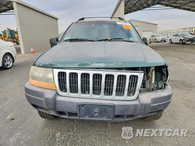Piąte zdjęcie samochodu w środku: 1999 JEEP GRAND CHEROKEE LAREDO VIN:1J4GW58S5XC687513 - miniatura
