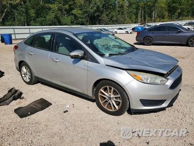 Czwarte zdjęcie samochodu z boku: 2016 FORD FOCUS SE VIN:1FADP3F26GL396957 - miniatura