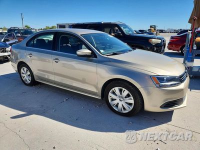 Czwarte zdjęcie samochodu z boku: 2013 VOLKSWAGEN JETTA SE VIN:3VWDX7AJXDM310363 - miniatura