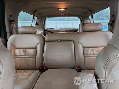 Zdjęcie 10 z 13 samochodu: 2000 FORD EXCURSION LIMITED VIN:1FMNU42SXYED11297 - miniatura