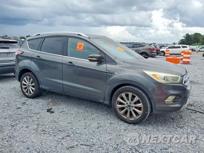 Czwarte zdjęcie samochodu z boku: 2017 FORD ESCAPE TITANIUM VIN:1FMCU0JDXHUA88980 - miniatura