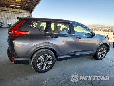 Trzecie zdjęcie samochodu z tyłu: 2017 HONDA CR-V LX VIN:2HKRW6H34HH214415 - miniatura
