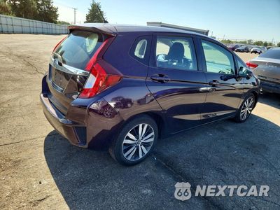 Trzecie zdjęcie samochodu z tyłu: 2016 HONDA FIT EX VIN:3HGGK5H73GM704886 - miniatura