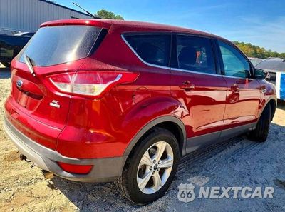 Trzecie zdjęcie samochodu z tyłu: 2014 FORD ESCAPE SE VIN:1FMCU9GXXEUA34063 - miniatura
