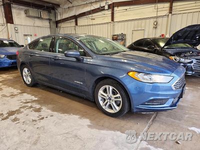 Czwarte zdjęcie samochodu z boku: 2018 FORD FUSION SE HYBRID VIN:3FA6P0LU9JR232396 - miniatura