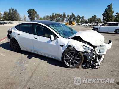 Czwarte zdjęcie samochodu z boku: 2023 TESLA MODEL 3 VIN:5YJ3E1EA5PF563076 - miniatura