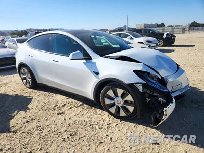 Czwarte zdjęcie samochodu z boku: 2021 TESLA MODEL Y VIN:5YJYGAEE6MF215480 - miniatura