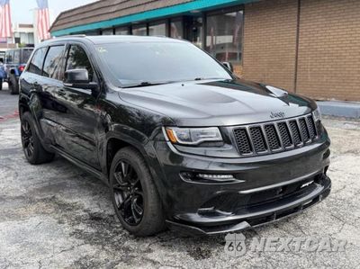 2014 JEEP GRAND CHEROKEE SRT-8 1C4RJFDJ9EC555495 - główne zdjęcie licytacji z USA - miniatura