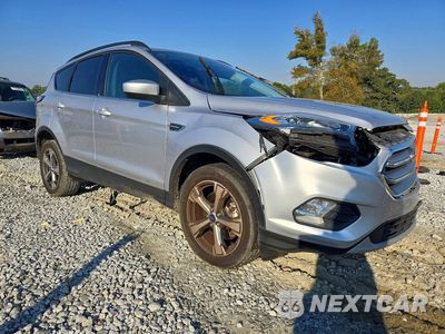 Czwarte zdjęcie samochodu z boku: 2017 FORD ESCAPE SE VIN:1FMCU0G95HUB64804 - miniatura