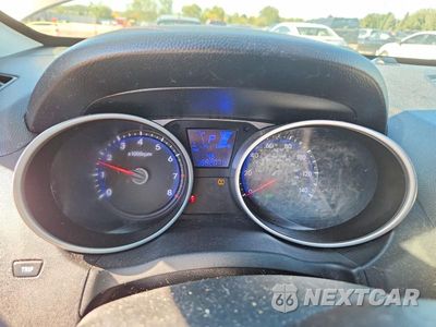 Zdjęcie 9 z 12 samochodu: 2013 HYUNDAI TUCSON LIMITED VIN:KM8JUCAC0DU711596 - miniatura