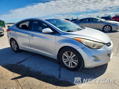 Czwarte zdjęcie samochodu z boku: 2013 HYUNDAI ELANTRA LIMITED VIN:KMHDH4AE1DU780810 - miniatura
