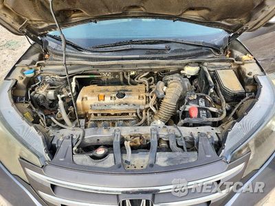 Zdjęcie 12 z 13 samochodu: 2012 HONDA CR-V EXL VIN:JHLRM4H73CC015134 - miniatura