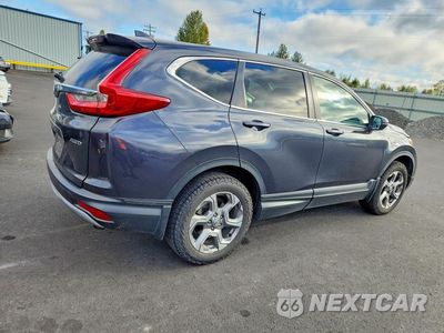 Trzecie zdjęcie samochodu z tyłu: 2017 HONDA CR-V EXL VIN:2HKRW2H8XHH676157 - miniatura