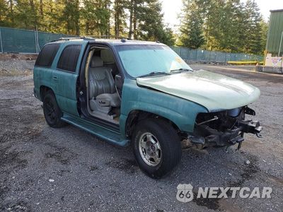 Czwarte zdjęcie samochodu z boku: 2004 CHEVROLET TAHOE K1500 VIN:1GNEK13Z64J201943 - miniatura
