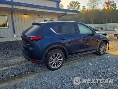 Trzecie zdjęcie samochodu z tyłu: 2021 MAZDA CX-5 GRAND TOURING VIN:JM3KFADM6M0412916 - miniatura