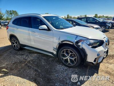 Czwarte zdjęcie samochodu z boku: 2019 BMW X1 XDRIVE28I VIN:WBXHT3C5XK5L35536 - miniatura