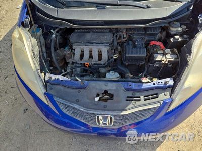 Zdjęcie 12 z 13 samochodu: 2010 HONDA FIT SPORT VIN:JHMGE8G43AS027737 - miniatura
