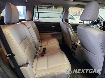 Zdjęcie 11 z 14 samochodu: 2018 HONDA PILOT TOURING VIN:5FNYF6H9XJB048311 - miniatura