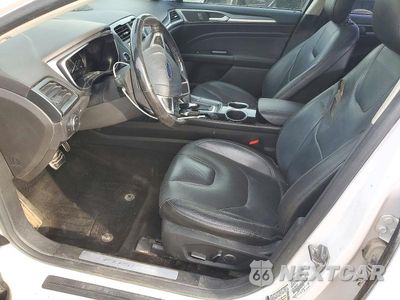 Zdjęcie 7 z 12 samochodu: 2013 FORD FUSION TITANIUM VIN:3FA6P0K99DR309916 - miniatura