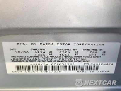 Zdjęcie 12 z 12 samochodu: 2007 MAZDA 3 VIN:JM1BK34L671652392 - miniatura