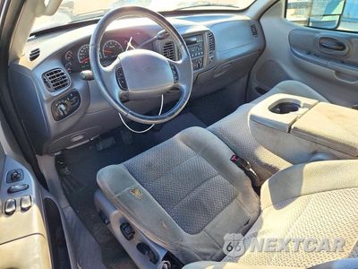 Zdjęcie 8 z 12 samochodu: 2001 FORD F150 VIN:2FTPX18L01CB00866 - miniatura