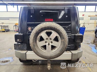 Zdjęcie 6 z 12 samochodu: 2008 JEEP WRANGLER UNLIMITED SAHARA VIN:1J4GA59178L570425 - miniatura