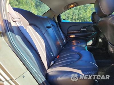 Zdjęcie 10 z 12 samochodu: 2000 CHRYSLER LHS VIN:2C3HC56GXYH370413 - miniatura