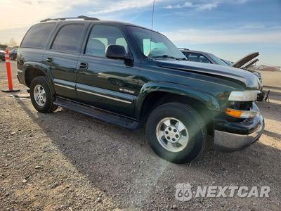 Czwarte zdjęcie samochodu z boku: 2002 CHEVROLET TAHOE C1500 VIN:1GNEC13Z92R181439 - miniatura