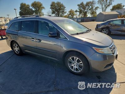 Czwarte zdjęcie samochodu z boku: 2011 HONDA ODYSSEY EXL VIN:5FNRL5H68BB097831 - miniatura