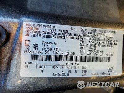 Zdjęcie 12 z 12 samochodu: 2017 FORD FOCUS TITANIUM VIN:1FADP3J25HL288368 - miniatura