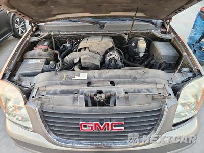 Zdjęcie 12 z 13 samochodu: 2009 GMC YUKON SLE VIN:1GKFC23C19R166365 - miniatura