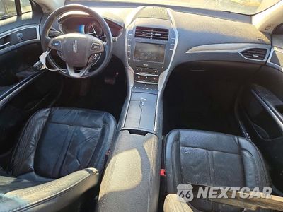 Zdjęcie 8 z 13 samochodu: 2016 LINCOLN MKZ HYBRID VIN:3LN6L2LUXGR623577 - miniatura