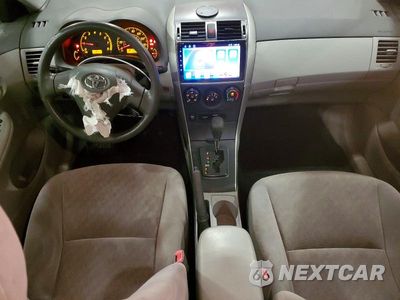 Zdjęcie 8 z 12 samochodu: 2009 TOYOTA COROLLA LE VIN:JTDBL40EX9J005118 - miniatura