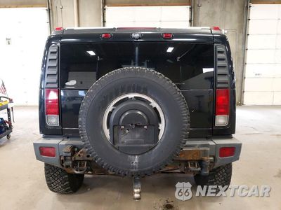 Zdjęcie 6 z 13 samochodu: 2006 HUMMER H2 VIN:5GRGN23UX6H120505 - miniatura