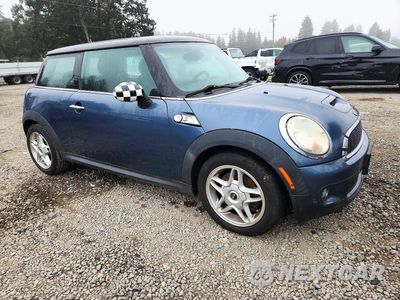 Czwarte zdjęcie samochodu z boku: 2010 MINI COOPER S VIN:WMWMF7C51ATZ70503 - miniatura