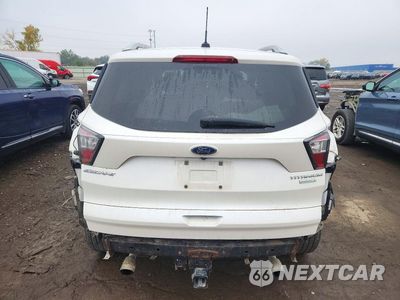 Zdjęcie 6 z 12 samochodu: 2017 FORD ESCAPE TITANIUM VIN:1FMCU9J95HUD09417 - miniatura