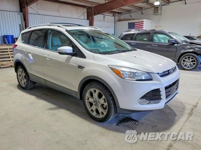 Czwarte zdjęcie samochodu z boku: 2015 FORD ESCAPE TITANIUM VIN:1FMCU0JX5FUC32068 - miniatura