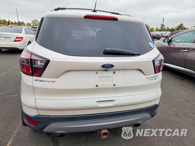 Zdjęcie 6 z 12 samochodu: 2017 FORD ESCAPE TITANIUM VIN:1FMCU9J99HUC95540 - miniatura