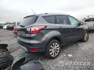 Trzecie zdjęcie samochodu z tyłu: 2017 FORD ESCAPE TITANIUM VIN:1FMCU9J91HUD41152 - miniatura