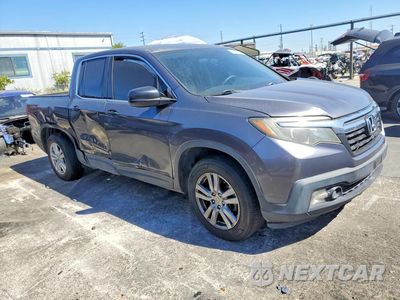 Czwarte zdjęcie samochodu z boku: 2017 HONDA RIDGELINE RT VIN:5FPYK2F23HB010124 - miniatura