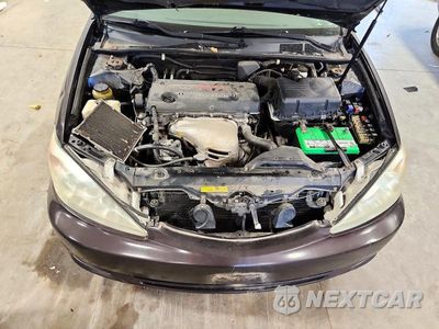 Zdjęcie 11 z 12 samochodu: 2002 TOYOTA CAMRY LE VIN:4T1BE32K42U544227 - miniatura