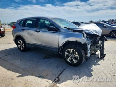Czwarte zdjęcie samochodu z boku: 2019 HONDA CR-V LX VIN:2HKRW5H3XKH413003 - miniatura