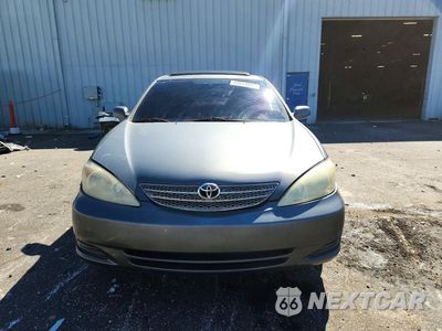 Piąte zdjęcie samochodu w środku: 2004 TOYOTA CAMRY LE VIN:4T1BE32KX4U882962 - miniatura