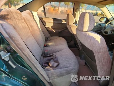 Zdjęcie 10 z 12 samochodu: 1999 HONDA CIVIC LX VIN:2HGEJ6671XH546825 - miniatura