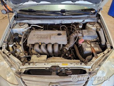 Zdjęcie 11 z 12 samochodu: 2003 TOYOTA COROLLA CE VIN:JTDBR32EX32014618 - miniatura