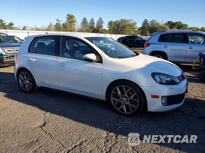 Czwarte zdjęcie samochodu z boku: 2014 VOLKSWAGEN GTI VIN:WVWGD7AJ6EW005002 - miniatura