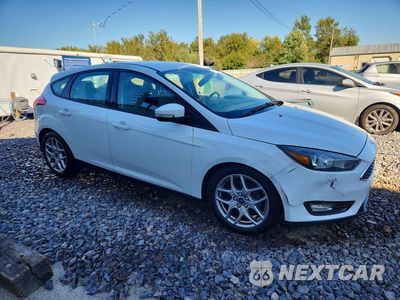 Czwarte zdjęcie samochodu z boku: 2015 FORD FOCUS SE VIN:1FADP3K22FL323265 - miniatura